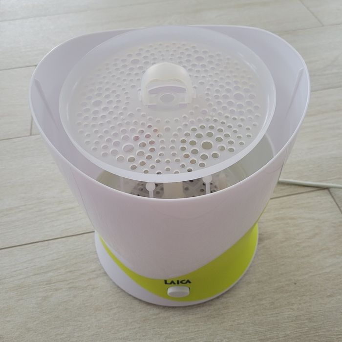 Vând sterlizator biberoane, marca Laica