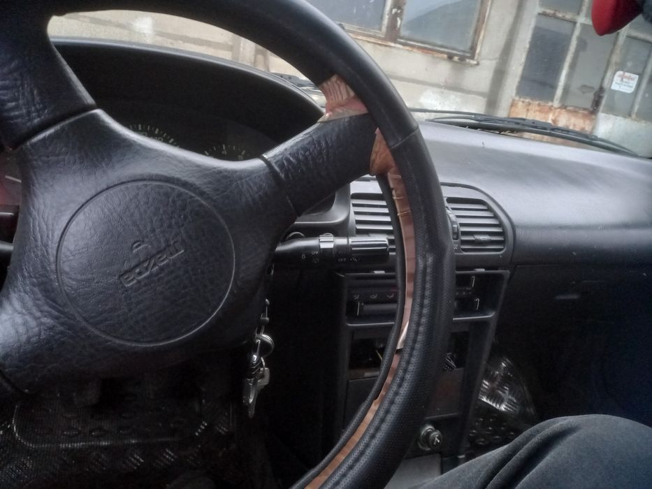 Мазда323 1.6 16 клапан,бензин.газ инжец