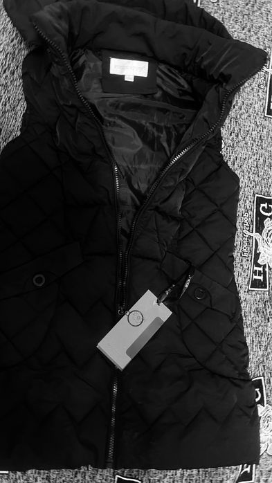 Безрукавка новая