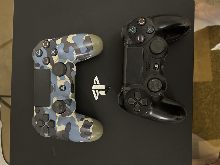 PlayStation 4 Pro + 2 джойстика + 9 игр