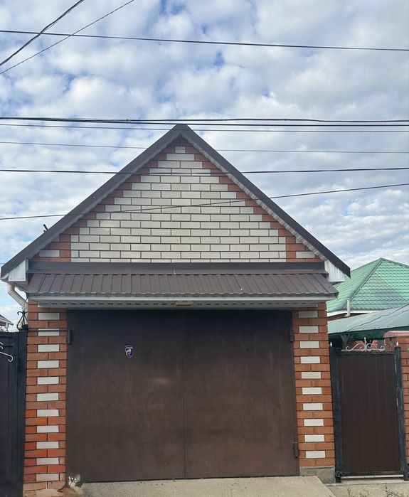 Продам дом с гаражом на 2 авто