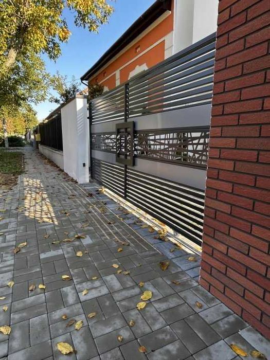 Porți Metalice Automatizate – Confort și Siguranță cu BalustradeTM