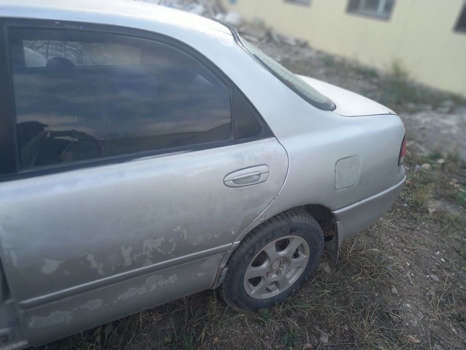 Продам двери на мазду кронос