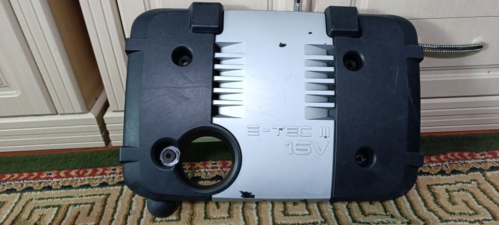 Ласетти мо́тор кры́шка́