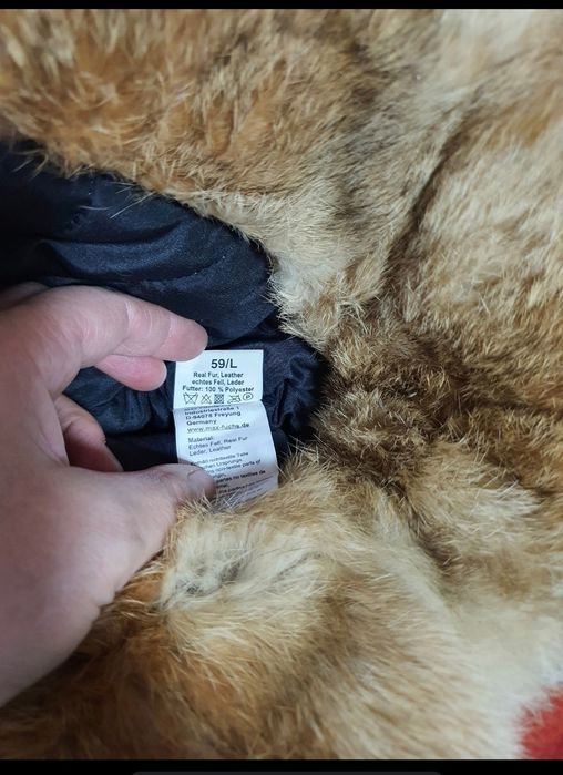 Caciula din piele naturala cu blana naturala;