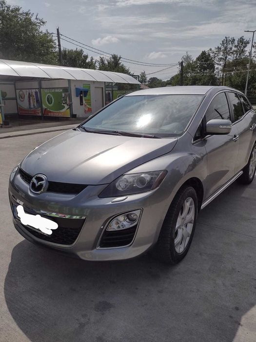 Vind Mazda CX7 ..