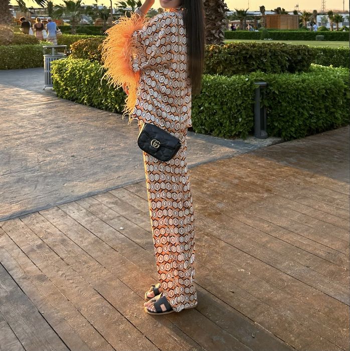 Двойка с перьями