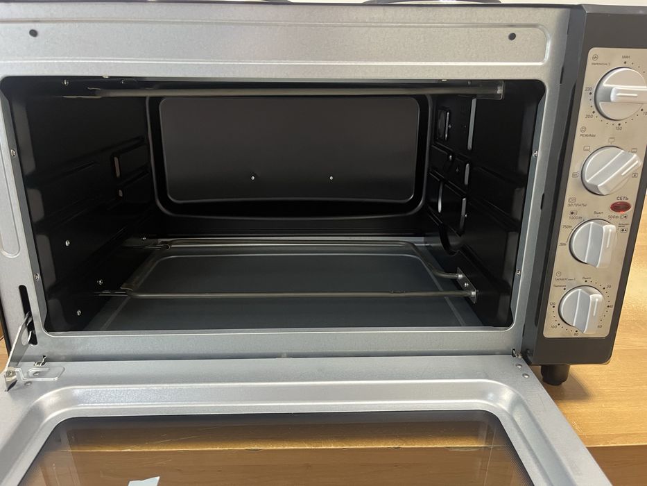 Продам плиту с духовкой новая