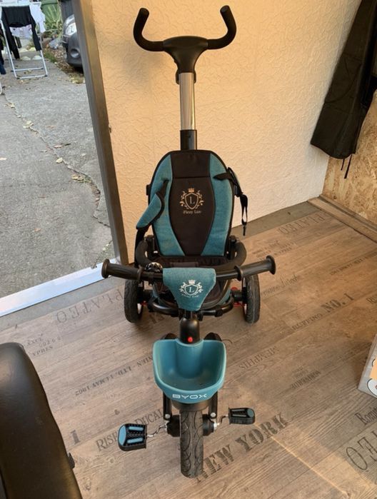 Tricicletă pliabilă cu scaun reversibil