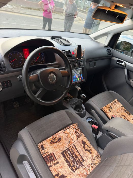 **volkswagen touran 1\.4 tsi 140 cp – 7 locuri – 2006**