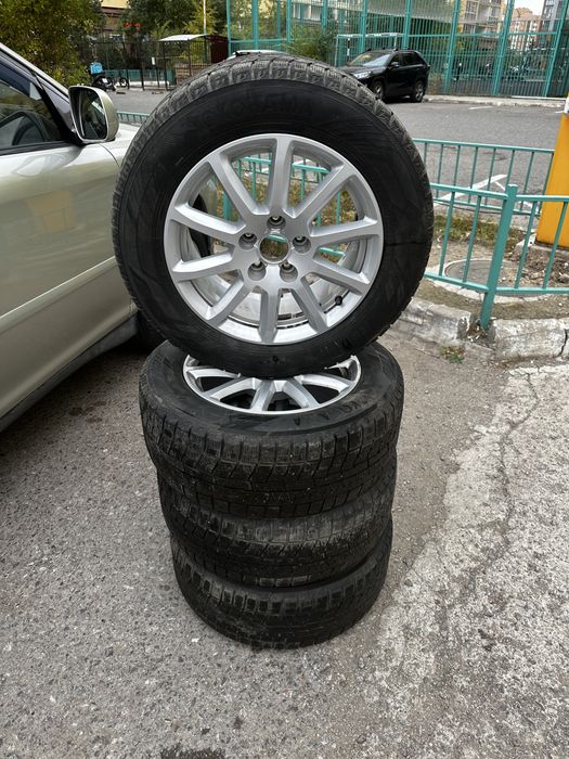 Продам зимние шины с дисками 225 55 R16