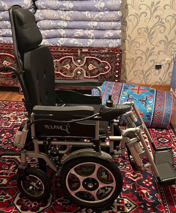 Электрическая инвалидная коляска