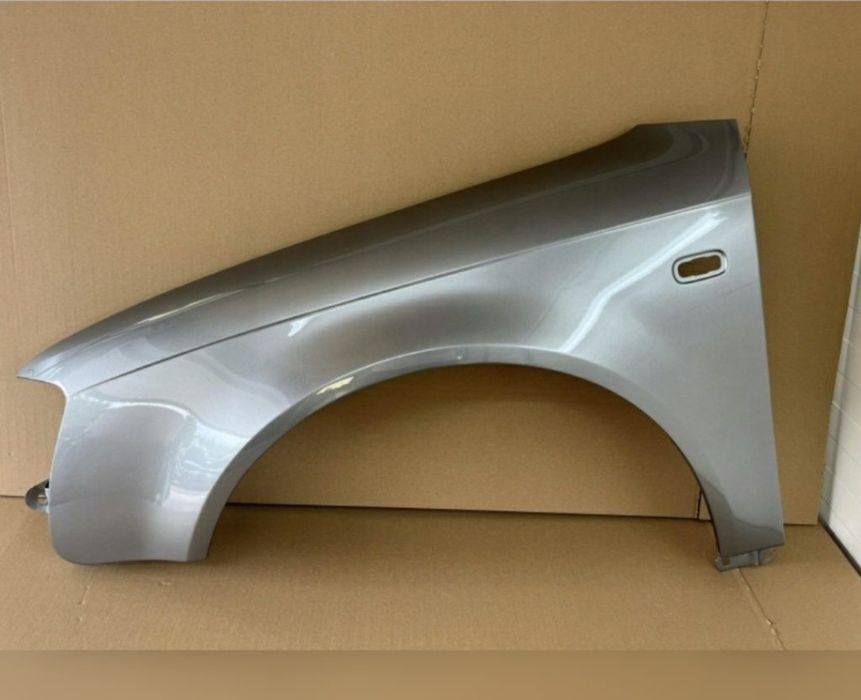 Aripa stanga fata vopsita gri cod vopsea LY7Q Audi A4 B7 2004 - 2007