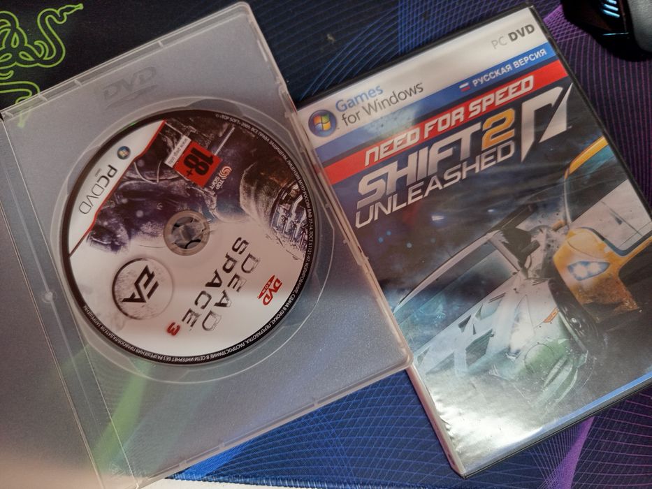 Два диска с играми нфс и даеад Спейс 3