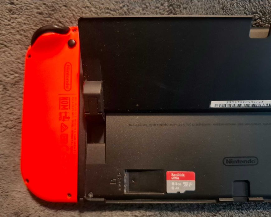 Nintendo Switch OLED Edition (пълен комплект) + допълнителна памет + калъф + акаунт със 7 топ игри