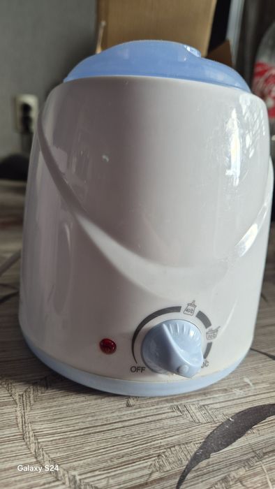 Уред за затопляне на бебешки шишета