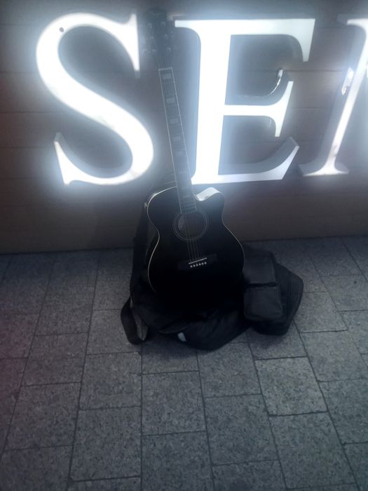 преподаватель по гитаре