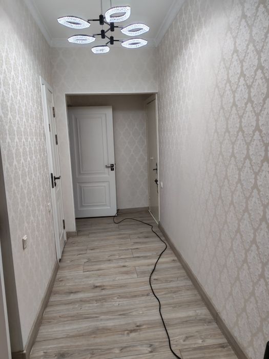 Продаю 2/1/5 Юнусабад 17  с ремонтом, огород, подвал, парковка.