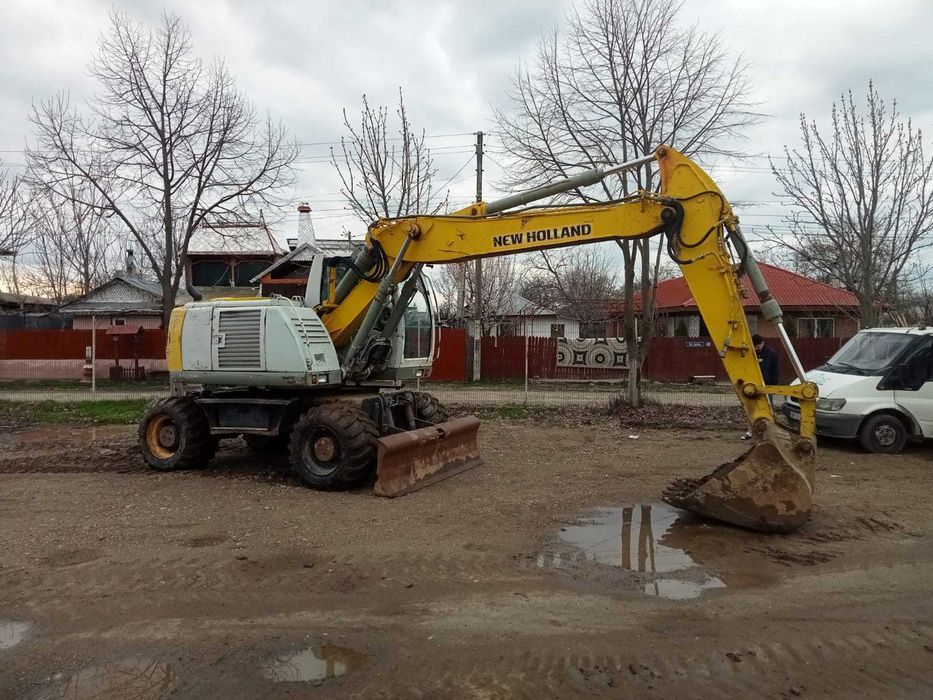 Vand/schimb Excavator New Holand MH City 16t