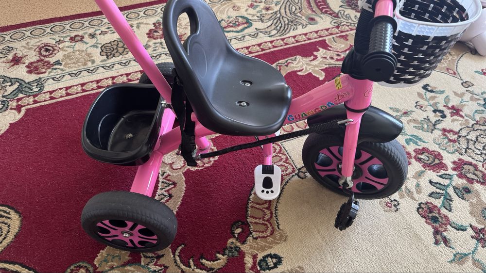 Трёхколёсный велосипед  розовый.