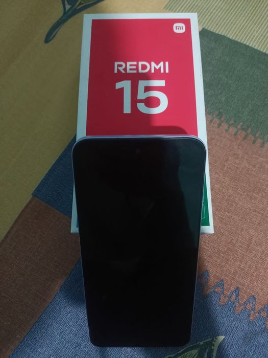 Продам телефон редми 15