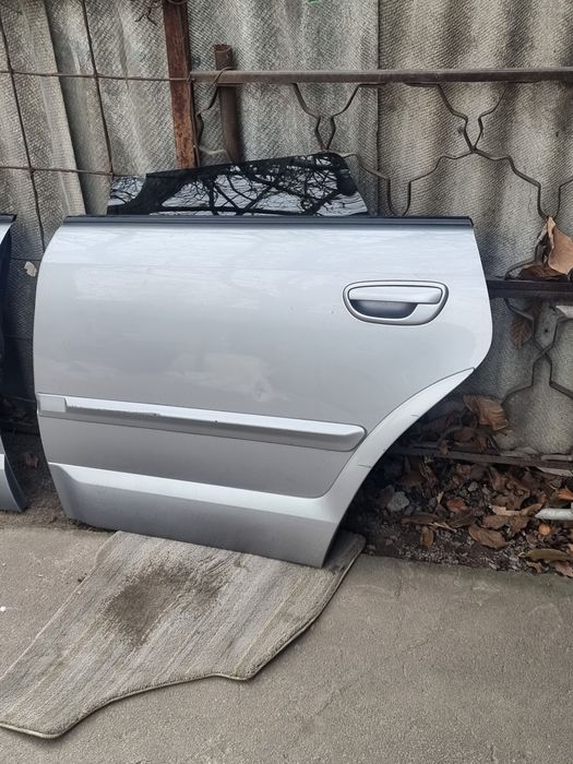 Двери на Subaru Outback BP.