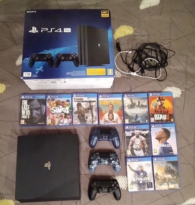 Play Station 4 Pro(ultima versiune) 1Tb+ 3 controllere+ 10 jocuri+accesorii+cutie
