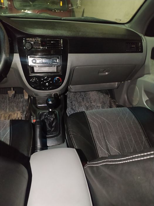 Lacetti 1.8 mator gaz bor holat yaxshi