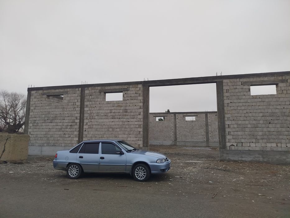 8 сотих майдонга курилган омборхона учун мулжалланган бино сотилади