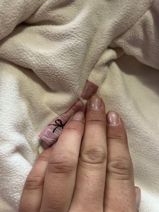 Бебешка вълнена жилетка