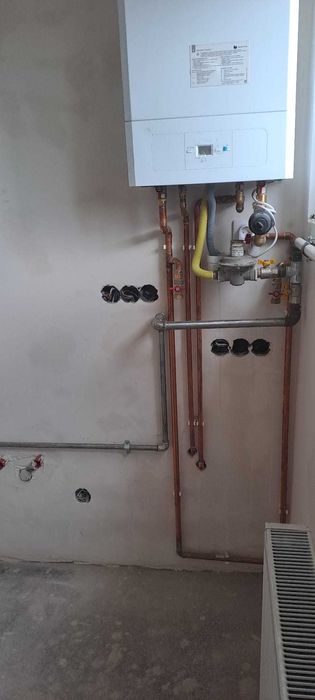 Serviciu de spalare instalatii sanitare si montare centrale termice