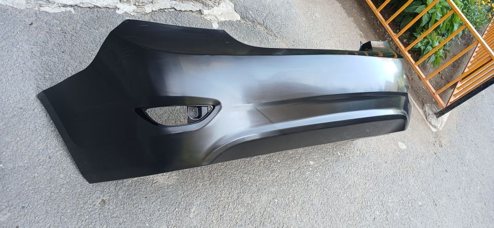 Бампер на акцент задний бампер Hyundai Accent Solaris