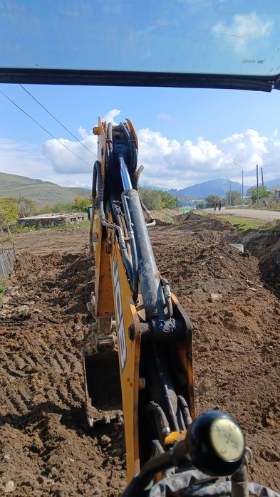 Услуги экскаватора погрузчика