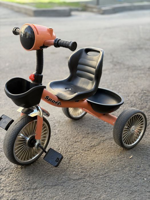 Трехколесный велосипед.