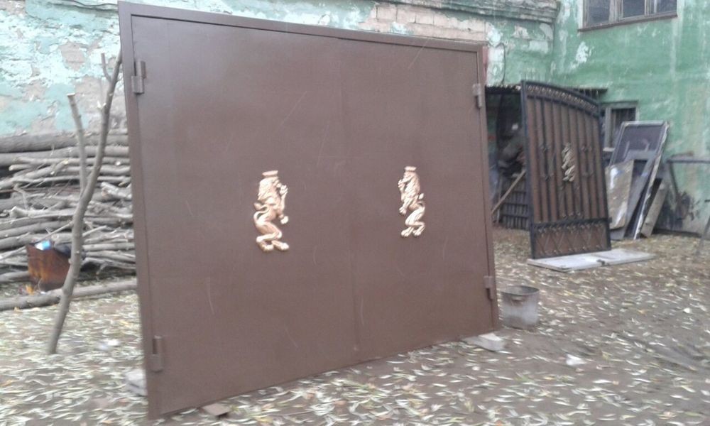 Заборы ворота двери решотки