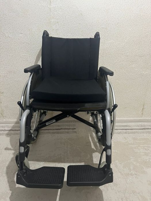 Инвалидная коляска