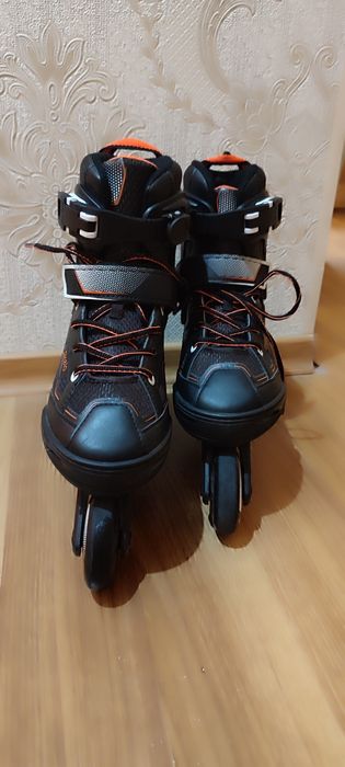 Роликовые коньки