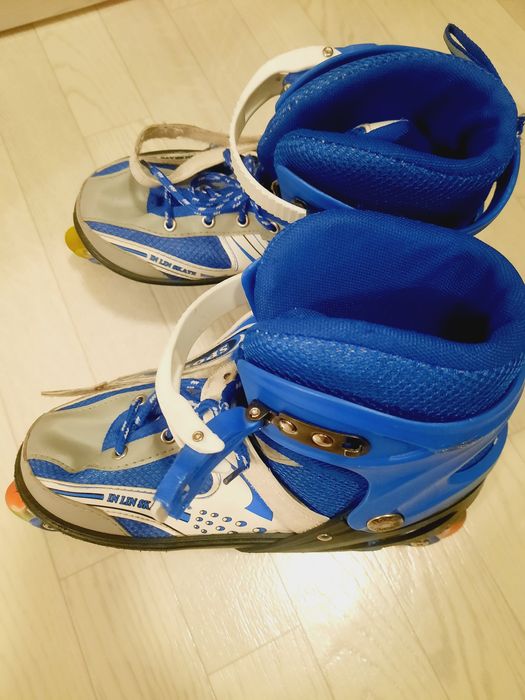 Роликовые коньки