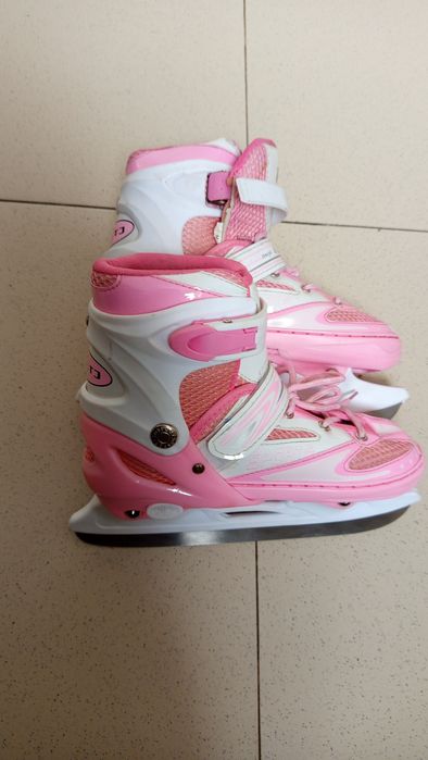 продам женские розовые коньки 34-39