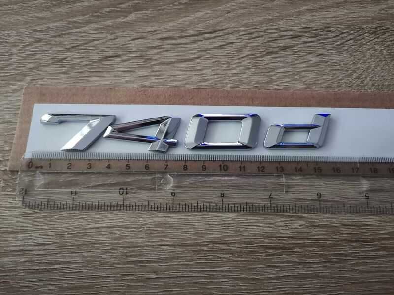 сребриста емблема BMW 740d