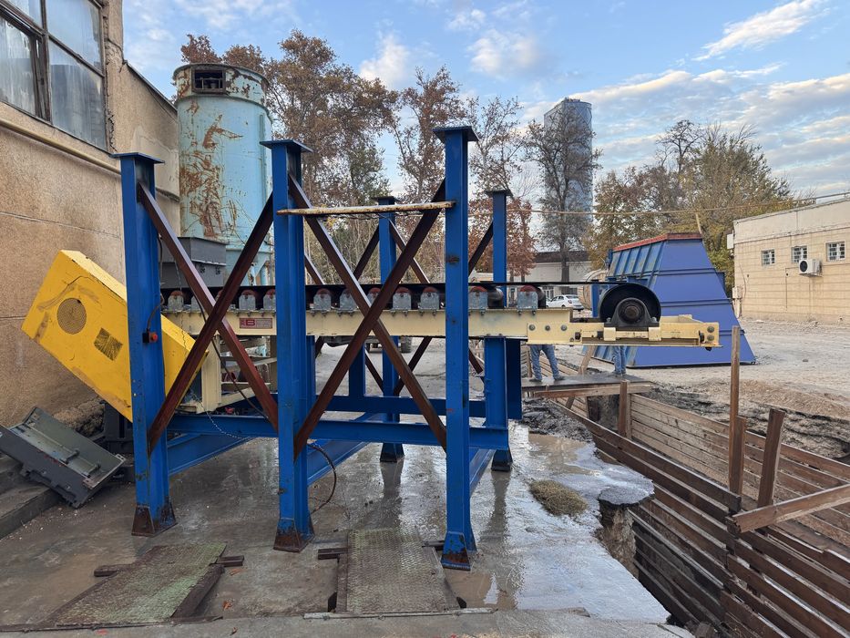 Вибропитател с конвиеаром американский