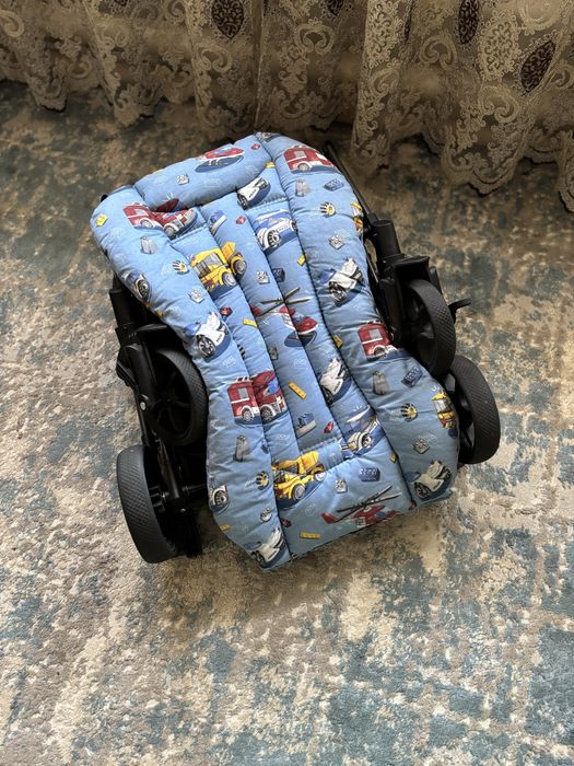 Продам коляску и ходунок