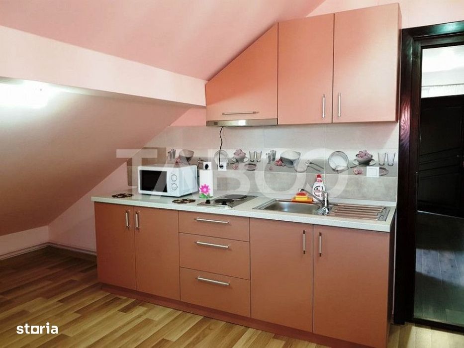 Apartament de inchiriat  56 mpu 2 camere mansarda in vila Selimbar