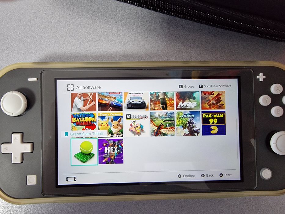 Nintendo Switch Lite + peste 20 de jocuri