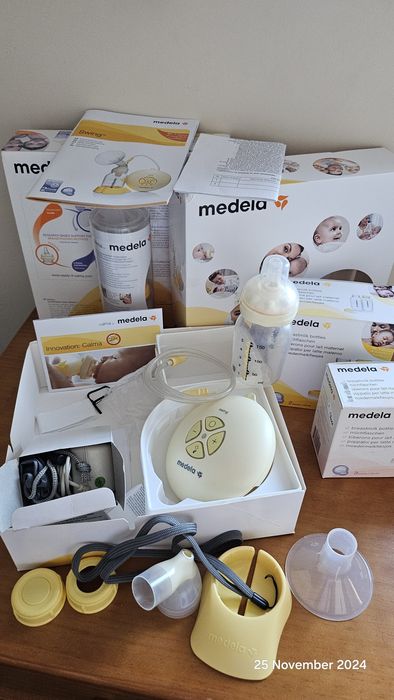 Pompă electrică Medela + biberoane