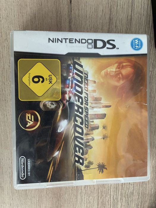 Nintendo dsi (modat) cu 2 jocuri si o carcasa