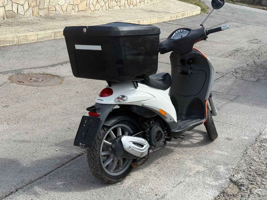 Преводача се скутер ПИАДЖО