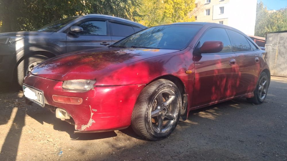 Продам машину Mazda 323