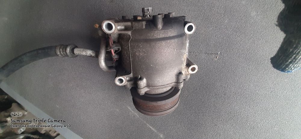 Компрессор кондеционера