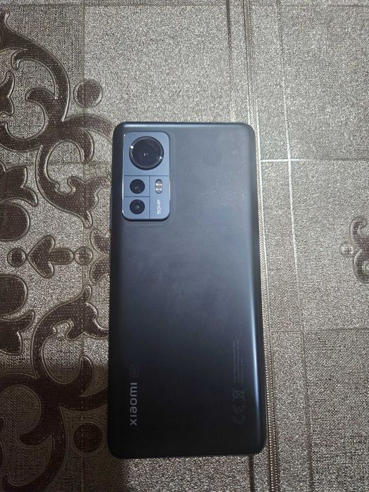 Xiomi 12 128 xotira rangi qora karobka dokument bor original zaryadka